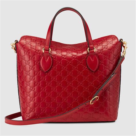 red gucci signature purse|red Gucci purse outfit.